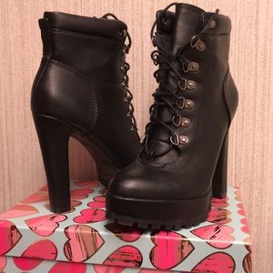 Black leather heeled boots